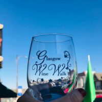 Stemless wine glass that says Glasgow MO Wine Walk